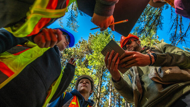 Tony Guay takes his students out into the Demeritt Forest to conduct GPS exercises.