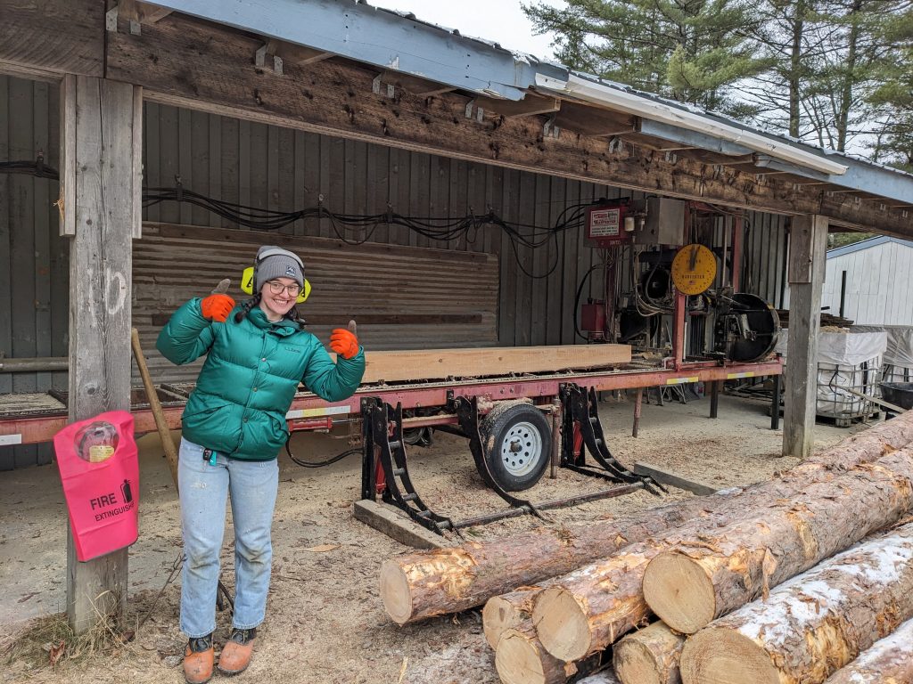 Student works with sawmill at UForests.